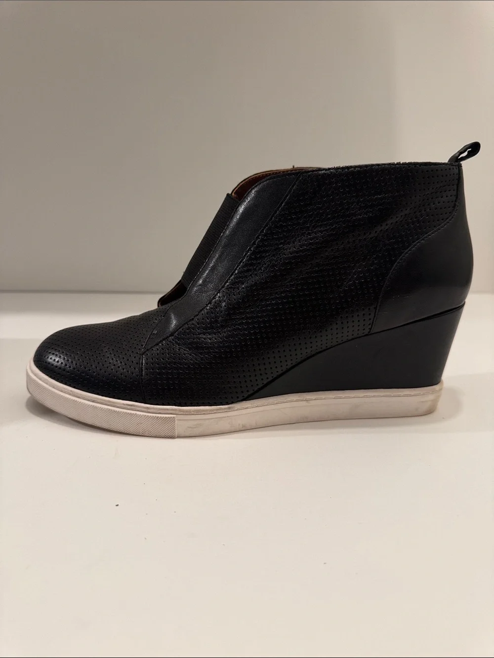 L.Paolo Women’s Black Leather Perforated Wedge Sneakers